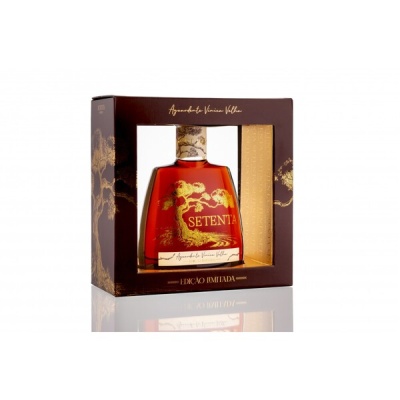 Frasco de vidro vermelho com detalhes dourados em caixa preta e dourada