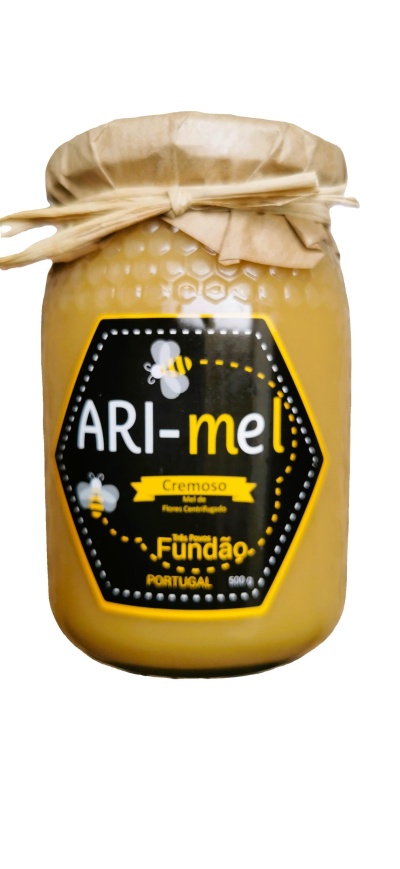 Frasco de mel cremoso ARI-mel com tampa de papel castanho e etiqueta preta com abelhas