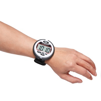 Relógio digital de pulso preto e branco com visor LCD mostrando 10:10