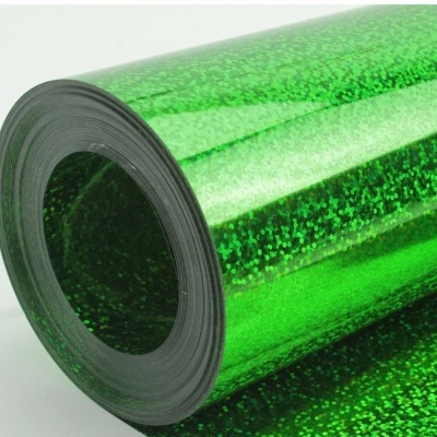 Rolo de película autoadesiva verde brilhante com pontos
