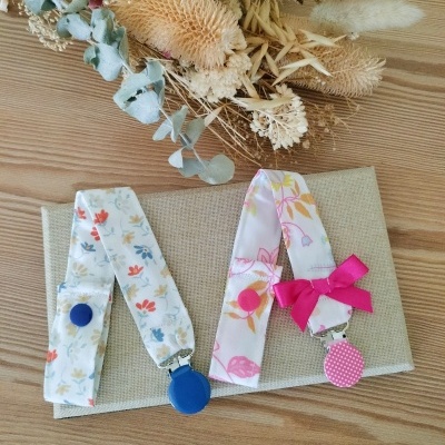 Conjunto 2 prendedores de chucha