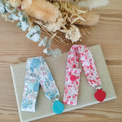 Conjunto 2 prendedores de chucha