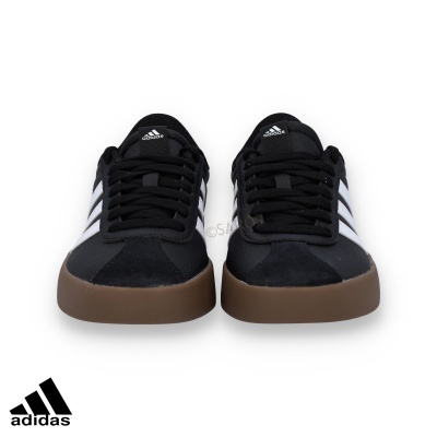 Sapatilhas Adidas pretas com riscas brancas e sola castanha