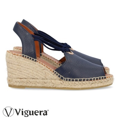 Sandálias de cunha azul escuro com salto em corda e detalhe de laço