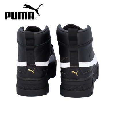 Sapatilhas desportivas PUMA pretas com risca branca e logótipo dourado vistas de trás