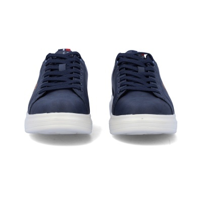 Ténis azul escura com sola branca e atacadores