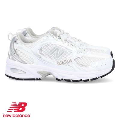 Ténis desportivos New Balance brancos e cinzentos