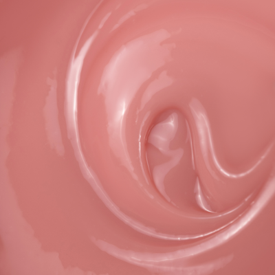Verniz de unha rosa cremoso com textura brilhante e espiral no centro