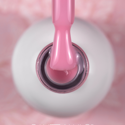 Garrafas branca de verniz para unhas rosa com pincel e texto SAUTE NAILS®