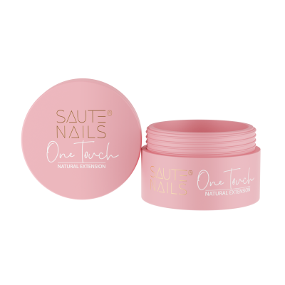 Frasco rosa de creme para unhas com tampa ao lado