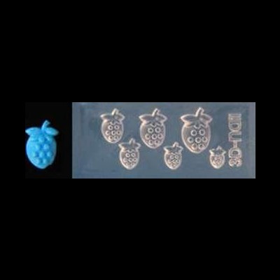 Moldes transparentes de silicone com formatos de abacaxis e texto PUFF, com abacaxi azul de silicone ao lado.