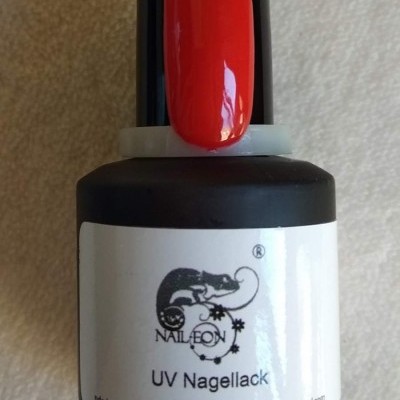Frasco de verniz de unhas UV NAIL LEON vermelho com rótulo branco