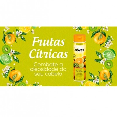 Frasco de champô Novex Frutas Cítricas com fundo verde ilustrado com frutas cítricas e texto promocional.