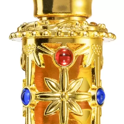 Frasco dourado decorativo com pedras coloridas e a palavra AMIRA na base