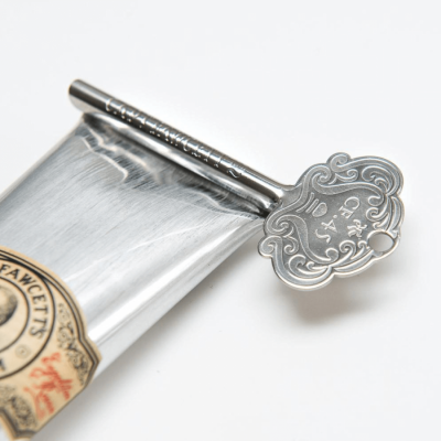 CAPTAIN FAWCETT METAL TUBE KEY