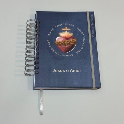 https://www.sofiarte.pt/product/planner-semanal-capa-rigida-sagrado-coracao-de-jesus