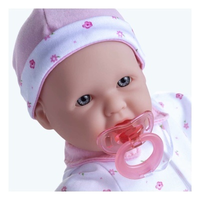 Boneca bebé com chupeta rosa e gorro com flores cor-de-rosa