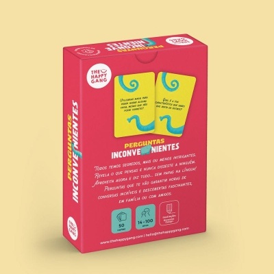 Embalagem do jogo de cartas Perguntas Inconvenientes cor rosa com texto em português.