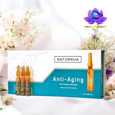Embalagem de NATURNUA Anti-Aging com ampolas pequenas em vidro âmbar e flores ao fundo