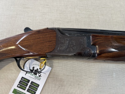 Espingarda de caça em madeira e metal com etiqueta SPORTARCO