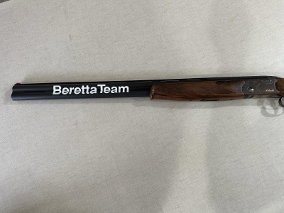 Espingarda de cano duplo BerettaTeam com madeira e cano preto