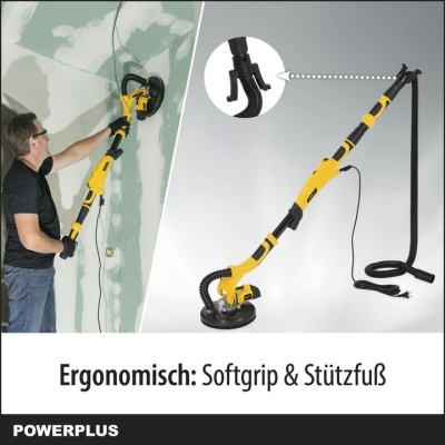 Lixadora eléctrica amarela e preta com cabo e suporte a ser usada numa parede