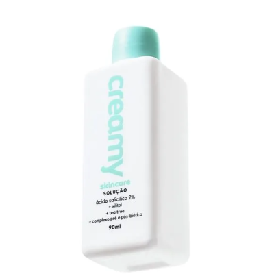 Frasco branco retangular com tampa azul clara e rótulo texto azul e preto