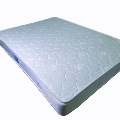 Colchão branco acolchoado com padrão hexagonal e texto ALOE VERA