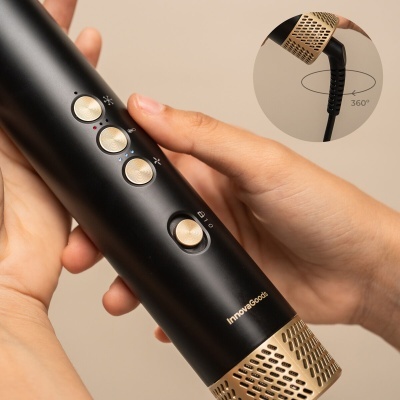 Secador de cabelo preto e dourado com botões e marca InnovaGoods