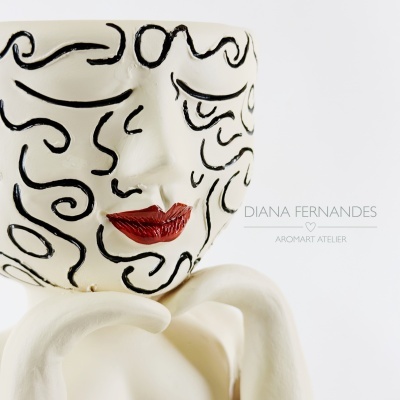 Jarra em cerâmica com rosto