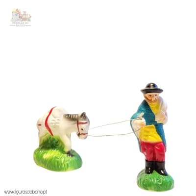 Homem moleiro com burro