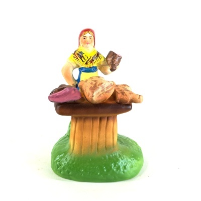 Mulher Vendedora de Enchidos na Banca