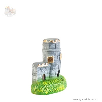 Castelo pequeno redondo com uma torre