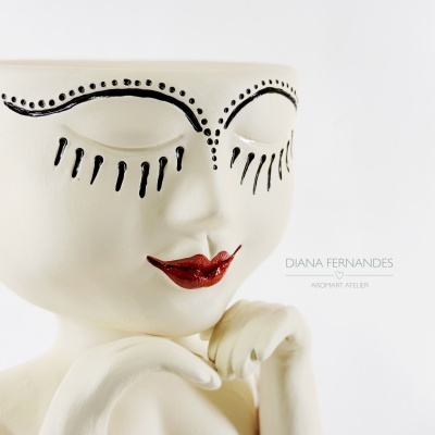 Jarra em cerâmica com rosto