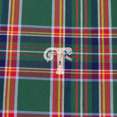 Tecido xadrez colorido com elemento metálico branco no centro