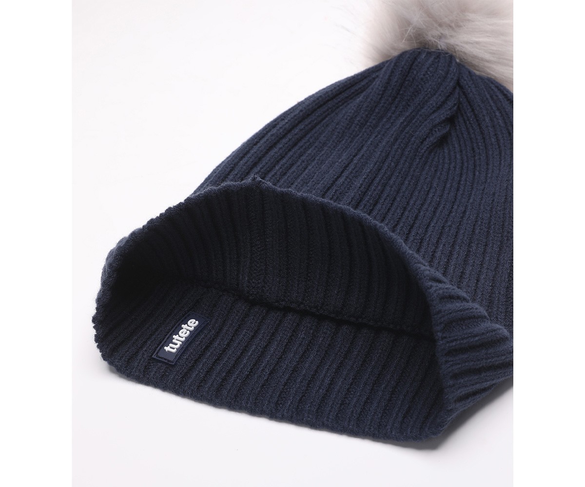 Gorro de malha azul com pompom cinzento e etiqueta Tutete