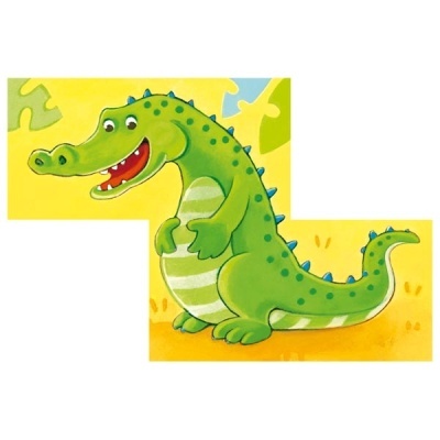 Desenho animado de um crocodilo verde com listras e manchas sobre fundo amarelo e peças de puzzle