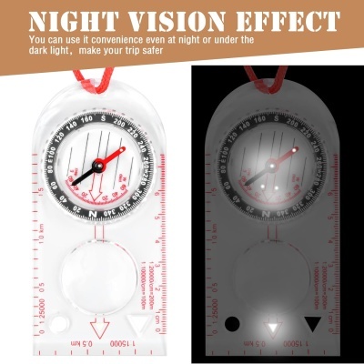 Bússola transparente com cordão vermelho e texto sobre efeito de visão noturna