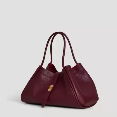 Mala de mão em pele granada com alças duplas e fecho dourado