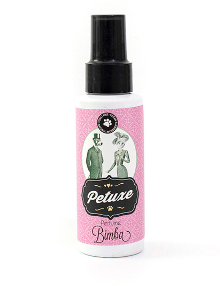 Frasco de perfume spray Petuxe cor-de-rosa com rótulo ilustrado e tampa preta