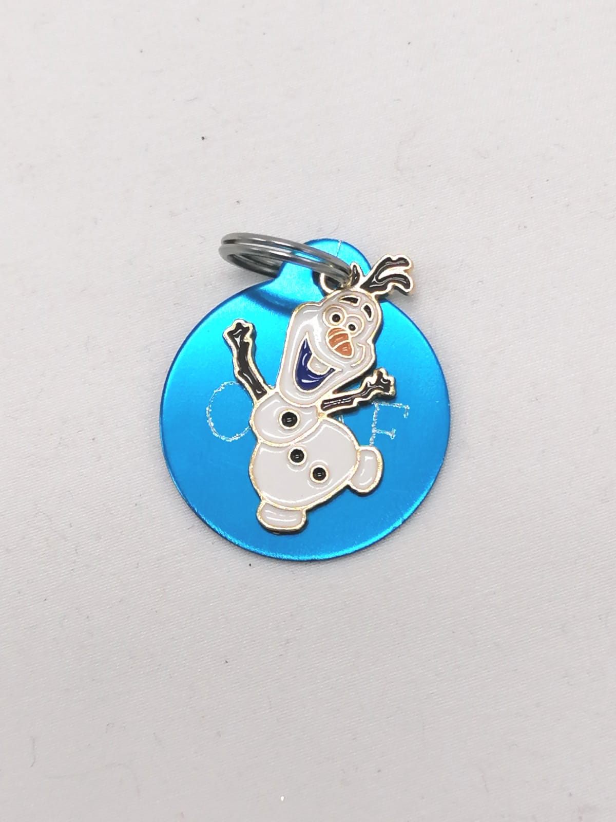 Medalha com pendente, Olaf