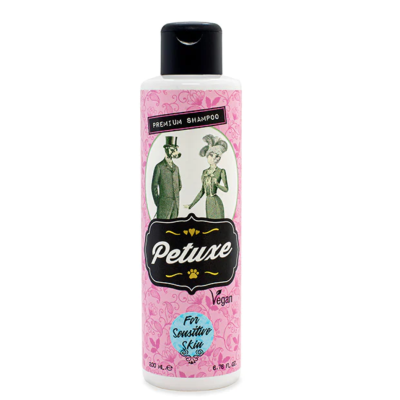 Frasco de shampoo Petuxe rosa com tampa preta e ilustração vintage