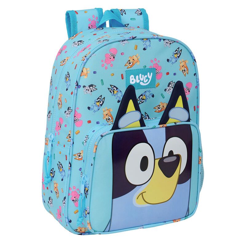 Mochila infantil azul com padrão e rosto de cão na frente