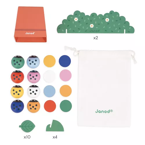 Peças coloridas redondas e verdes com saco branco Janod