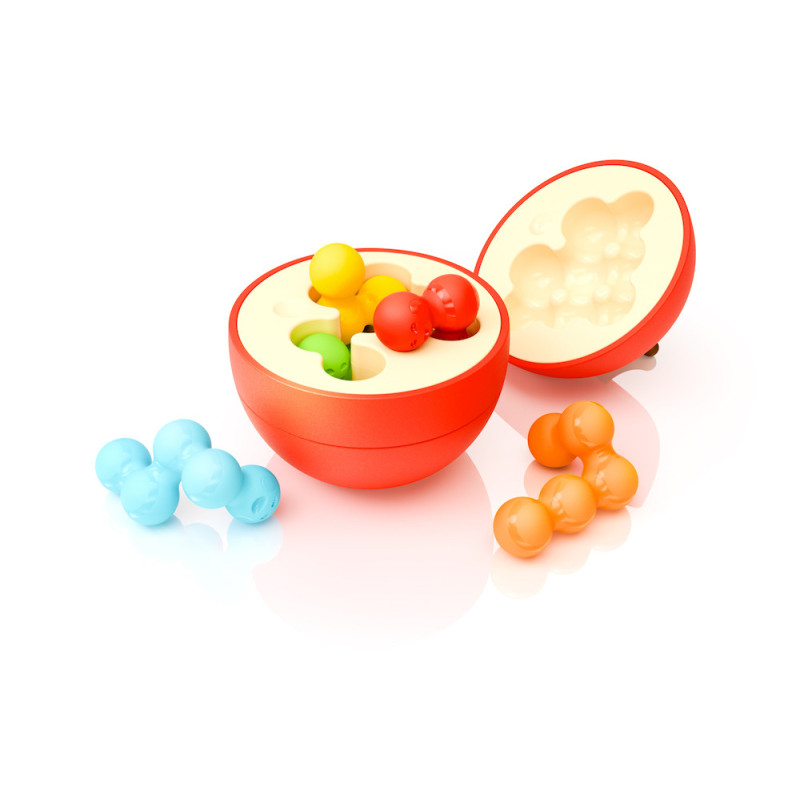 Brinquedo em plástico com bola vermelha partida e peças coloridas para encaixe