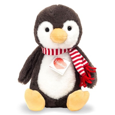 Pelúcia de pinguim com cachecol vermelho e branco