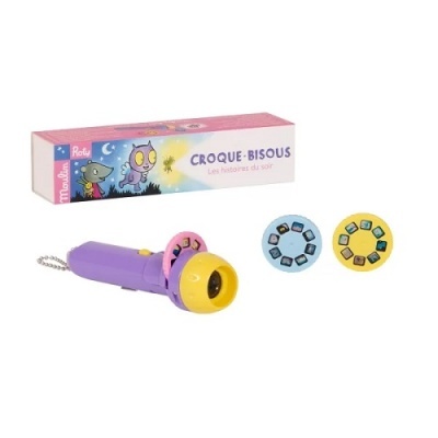 Projetor infantil roxo e amarelo com dois discos e embalagem CROQUE-BISOUS