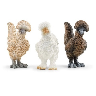 Três figuras decorativas de galinhas em cores bege, branco e castanho escuro