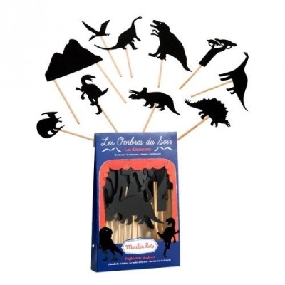 Sombras chinesas de dinossauros em cartão preto com pauzinhos de madeira numa embalagem azul.