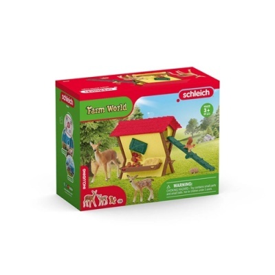 Caixa de conjunto de brinquedo Farm World da marca Schleich com figuras de animais e estrutura de alimentação.